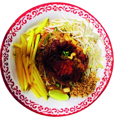 Pad Thai topped with fried soft shell crab